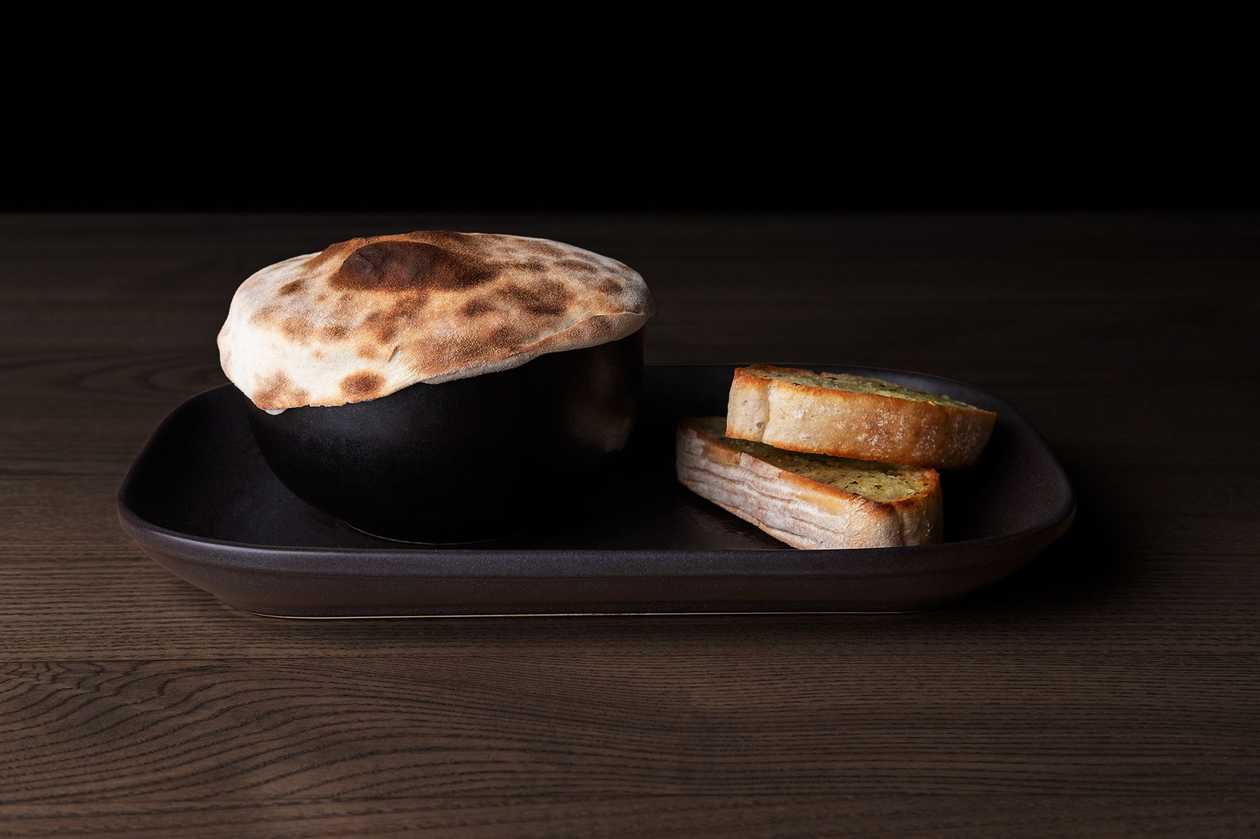 Chilli soup with ciabatta and hard cheese