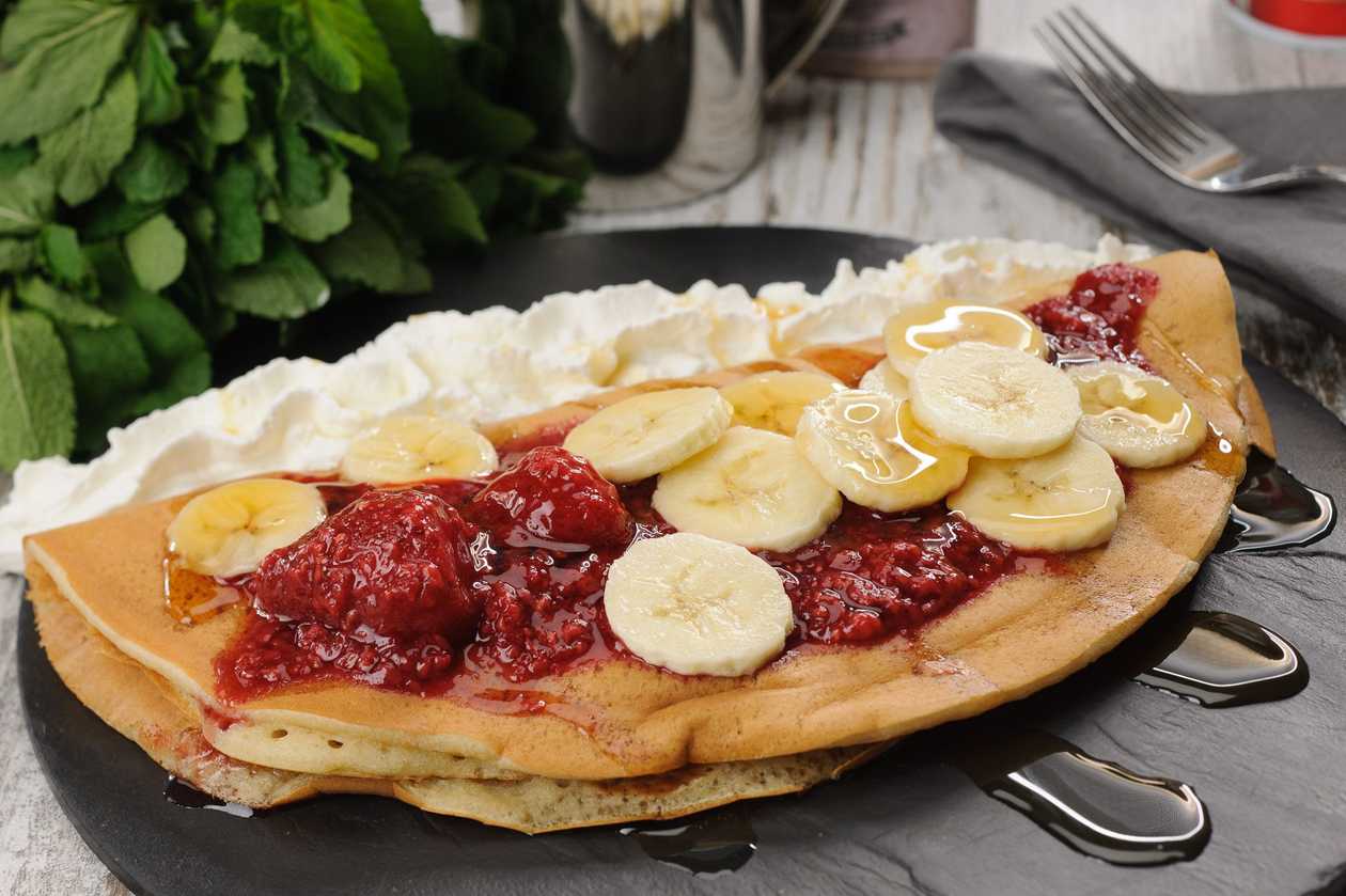 A huge American pancake with banana