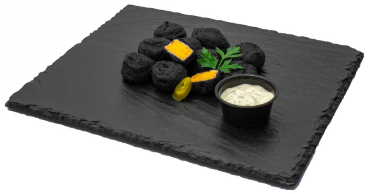 Cheddar cheese snack in black dough