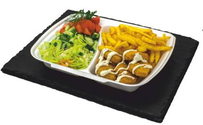 Dipped chicken steaks on a plate