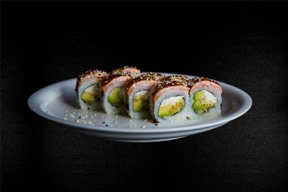 31. Salmon, avocado, Philadelphia cheese, tempura, Teriyaki sauce, sesame