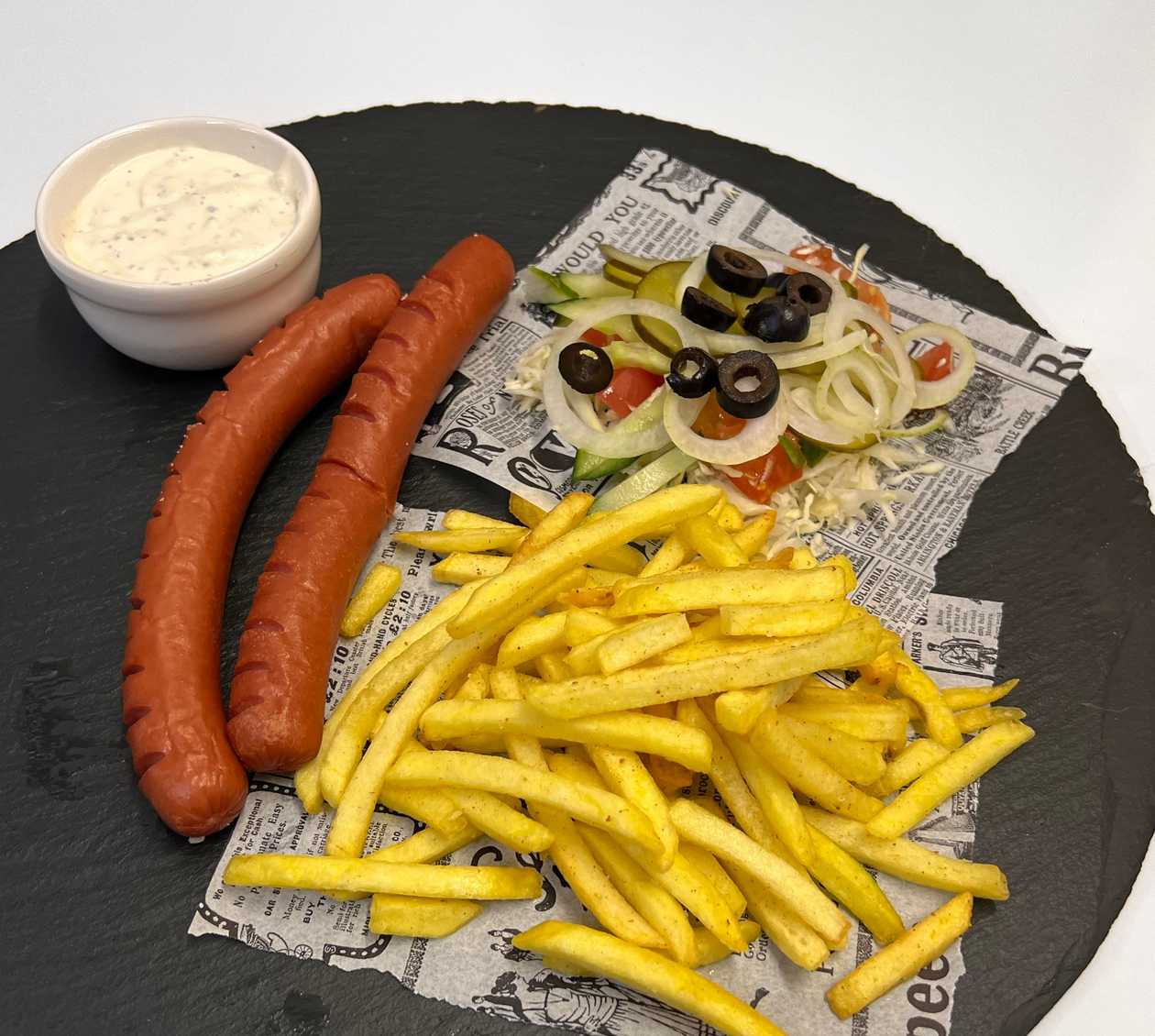 Sausages (2 pcs.), fries, selected sauce, vegetables