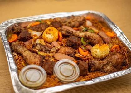 Jollof with fried plantain and Chicken