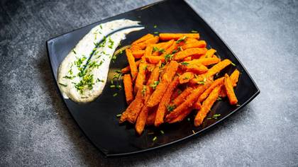 Sweet potatoes fries with tzatziki sauce