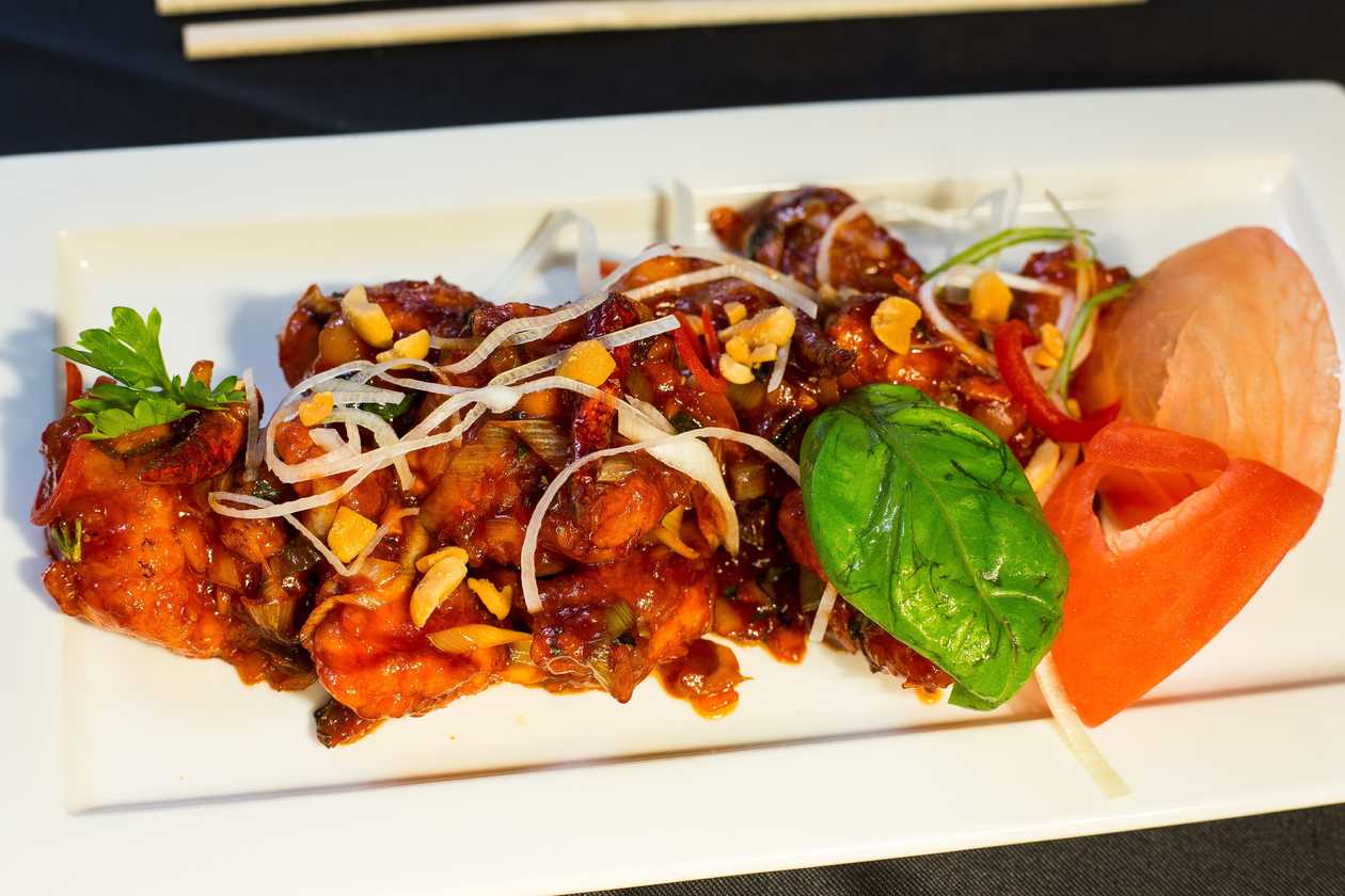 3. Tapay crispy chicken with some tomato sauce, perfected by our chef