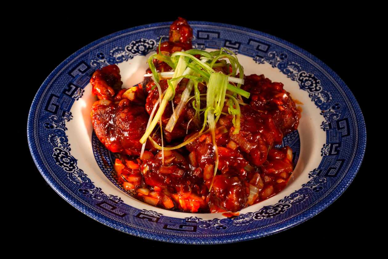 1. Juicy chicken wings cooked in our chef’s special style in hot garlic sauce