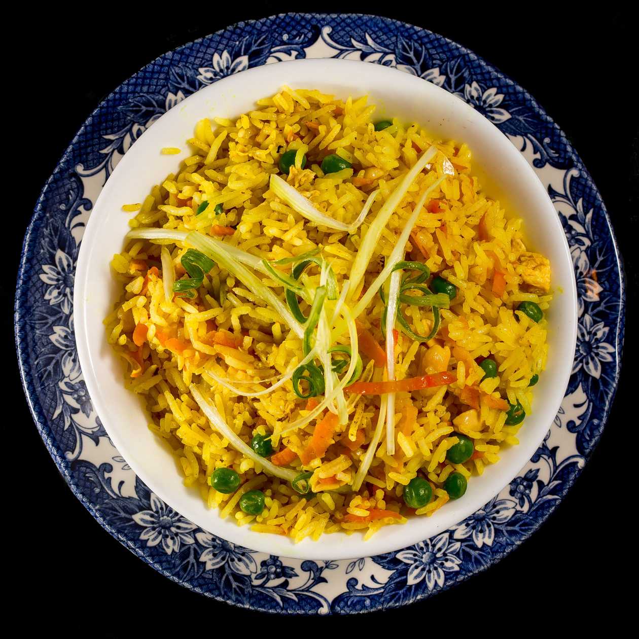 61. Yang chaw rice (chicken, pork, garlic, vegetables, egg with curry oil)