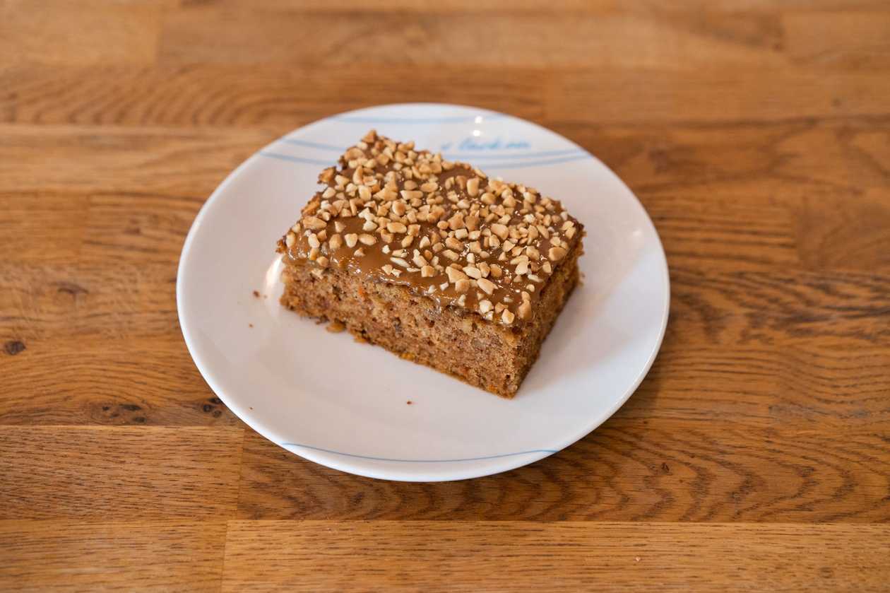 Carrot cake with caramel and peanuts