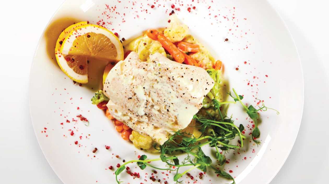 Steamed cod fillet with vegetables