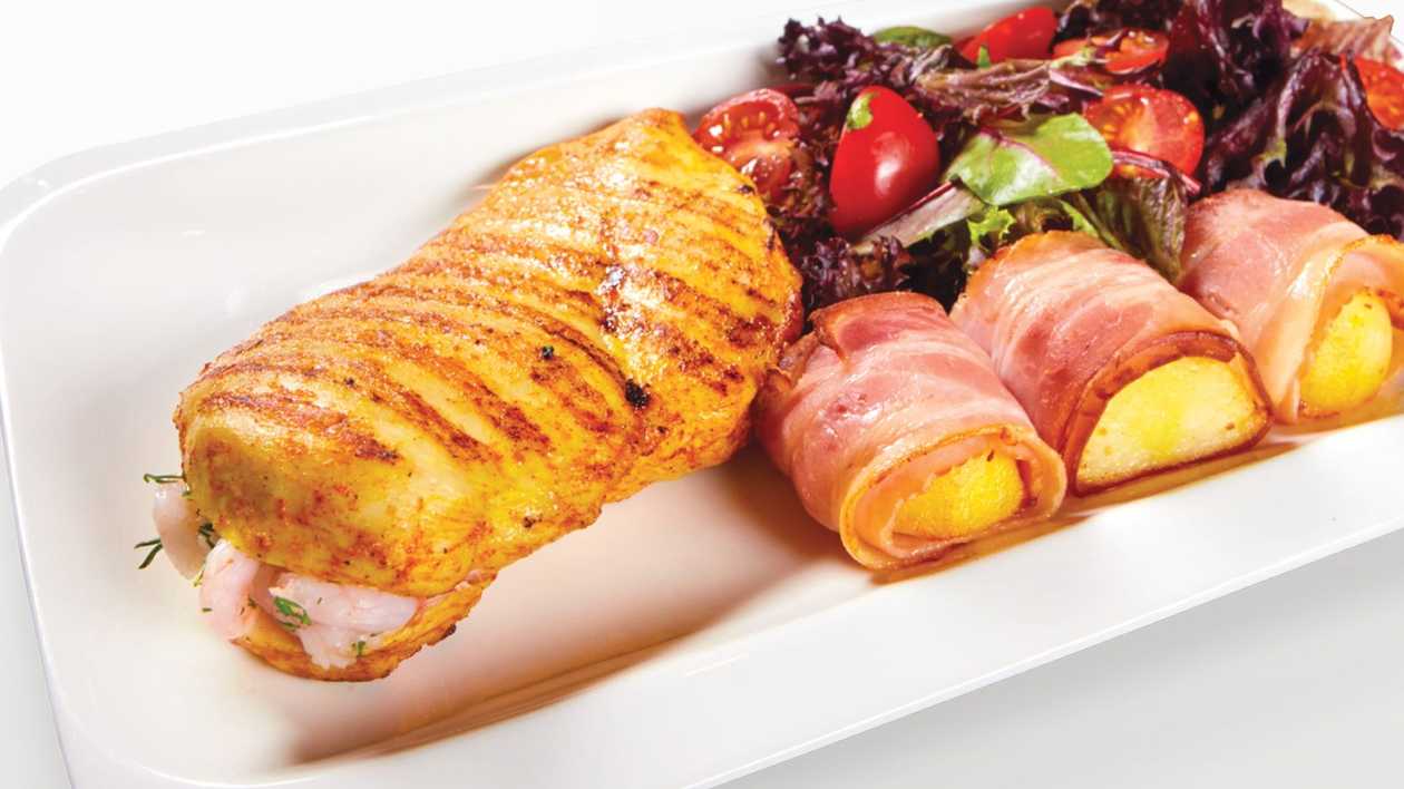 Grilled chicken fillet stuffed with shrimp and greens