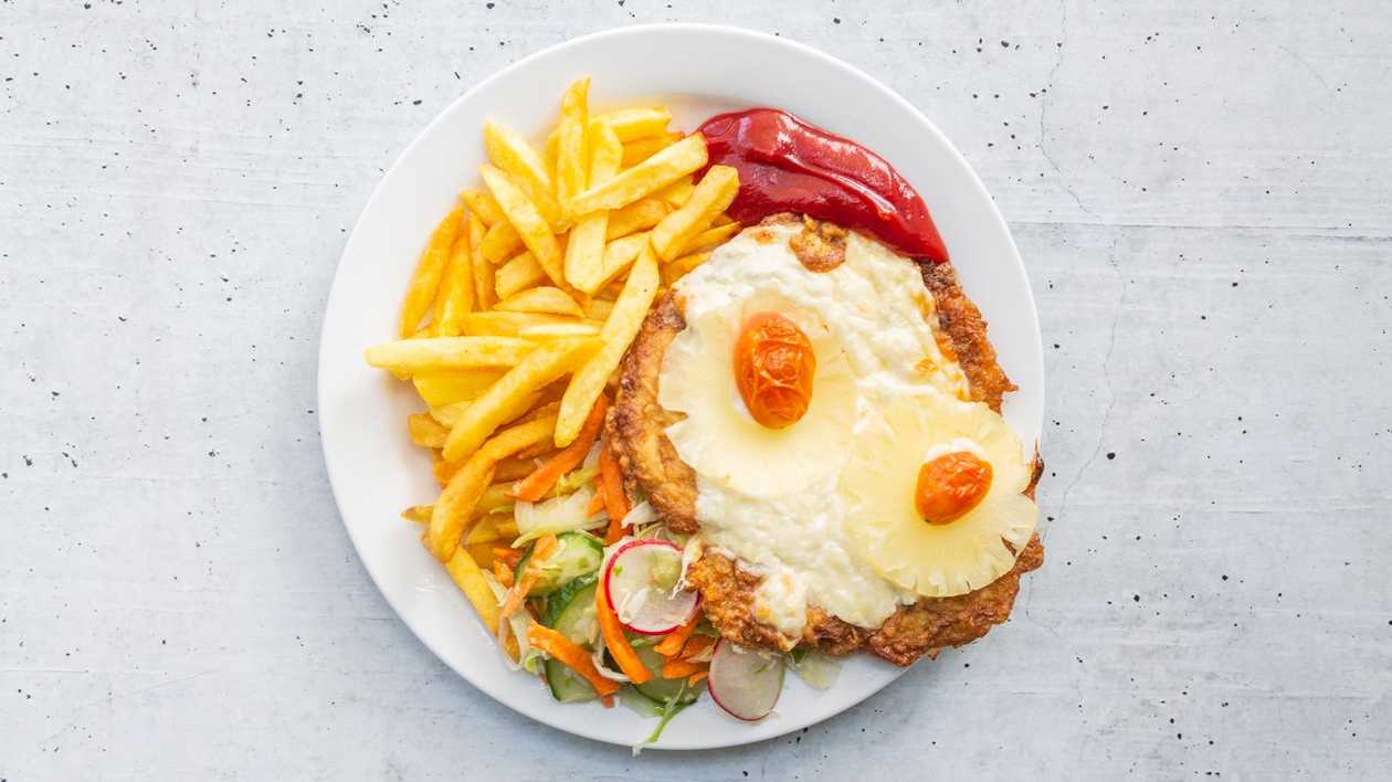 Chicken fillet with cheese and pineapple with french fries