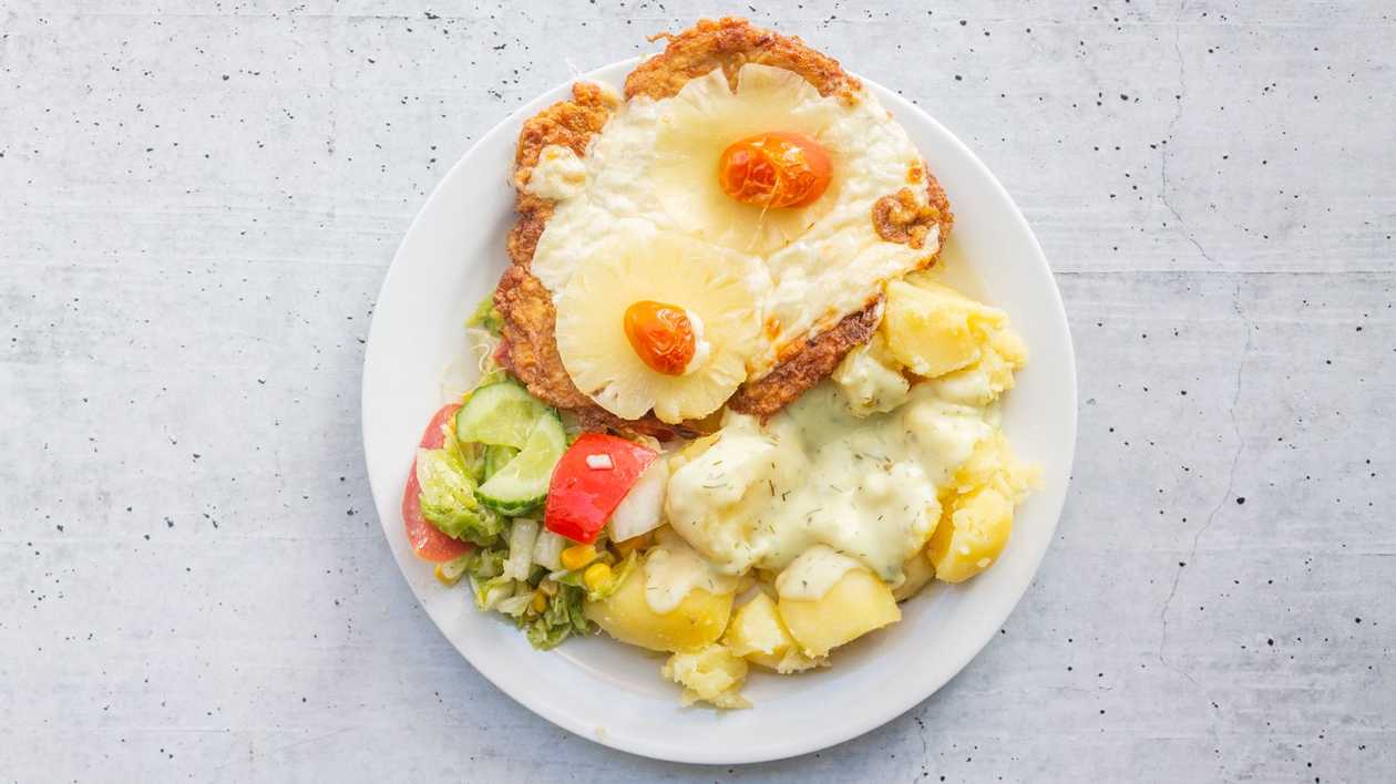 Chicken fillet with cheese and pineapple with boiled potatoes