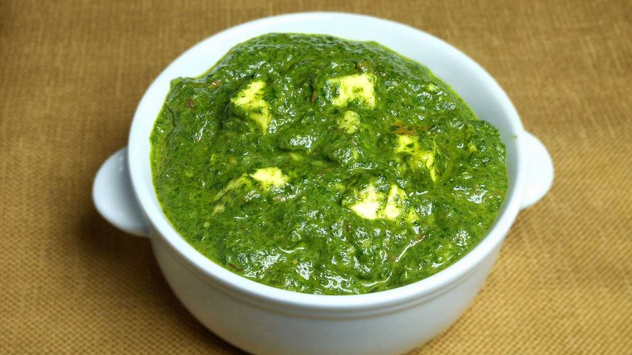 Indian palak paneer served with basmati rice.
