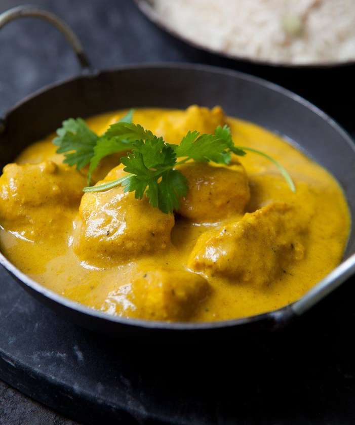 Chicken korma served with basmati rice.