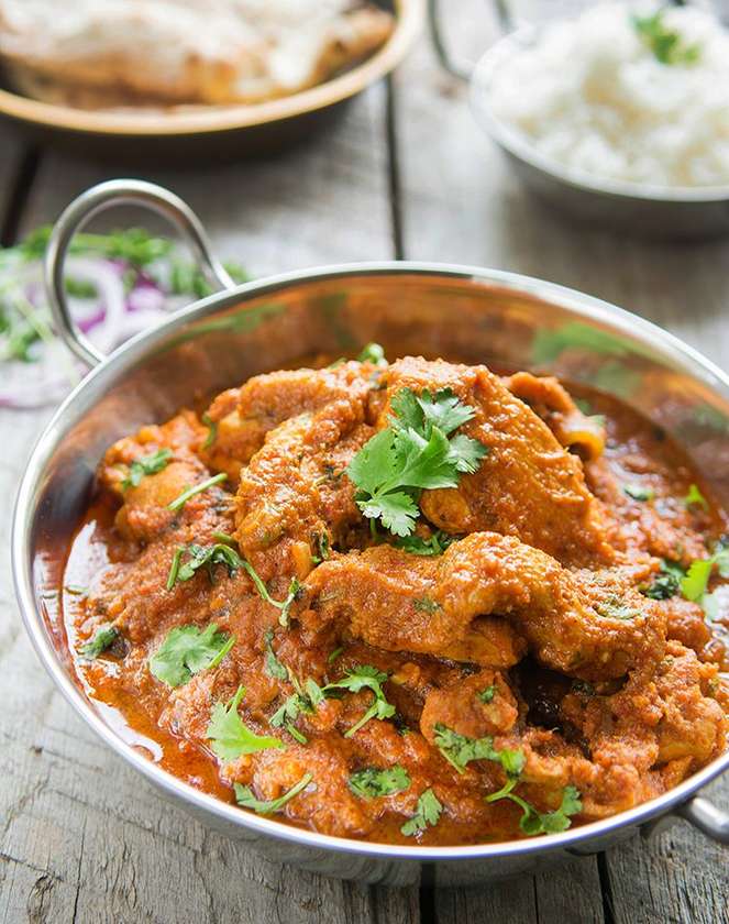 Chicken curry served with basmati rice.