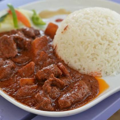 Plain Rice With Gizzard Sauce