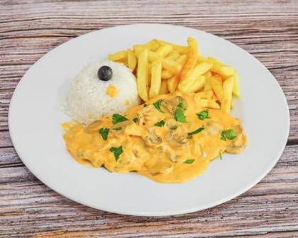 Chicken Strips with Mushroom Sauce, Fries, and Rice