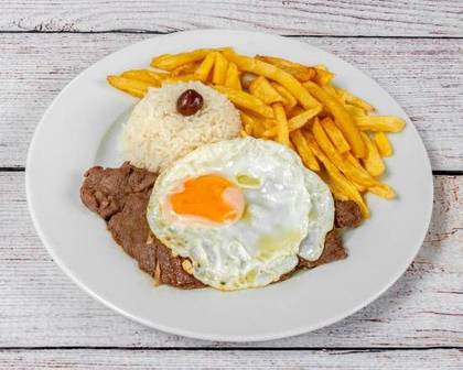 Veal Steak with Egg, Fries, and Rice