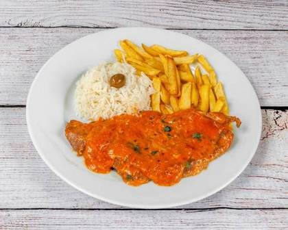 Veal Medallions with Onions, served with Rice and Fries