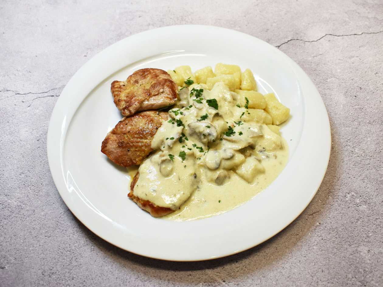 Pork tenderloin medallions in mushroom sauce, gnocchi