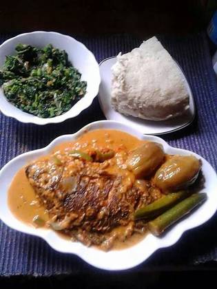 Whole Fish Curry with Ugali or Greens