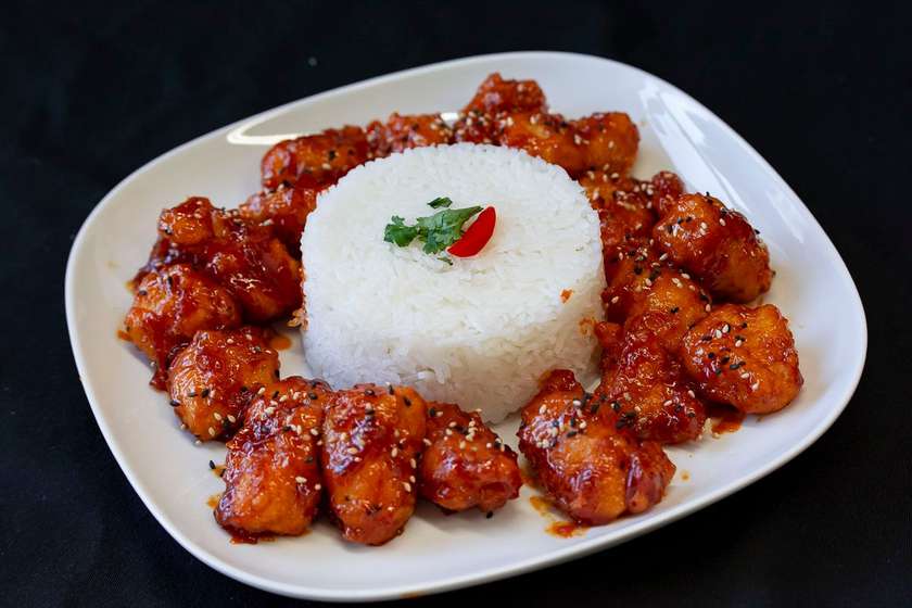 Chicken in sweet and sour sauce with jasmine rice