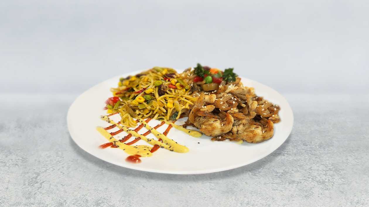 Baked noodles - big plate with chicken pieces