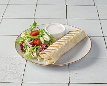 Wrap with beet cutlet, mozzarella, tomato and cucumber
