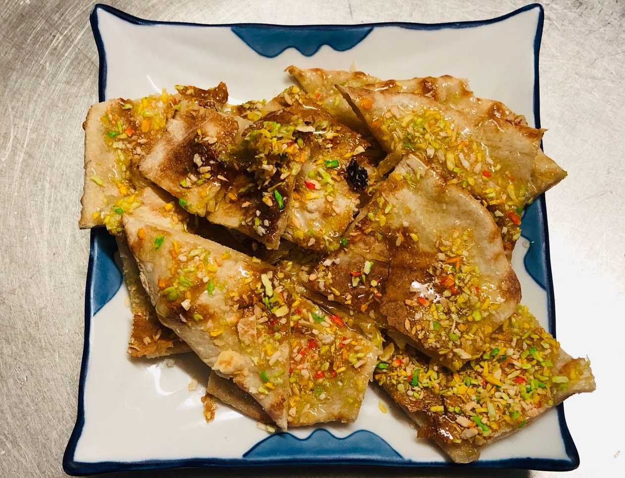 121. Peshwari Naan (available 13.00-21.00)