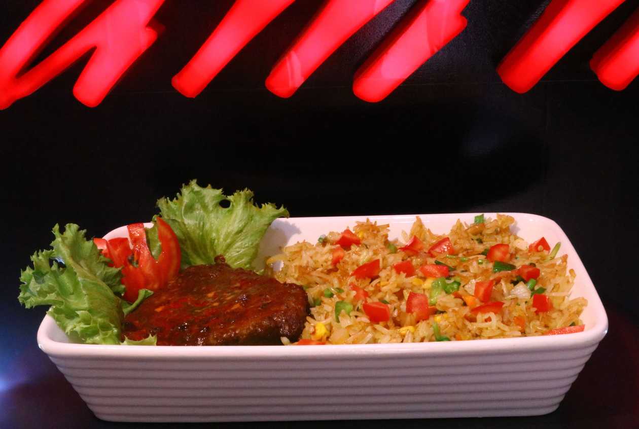 GRILLED FEAST Jollof and Beef Slice
