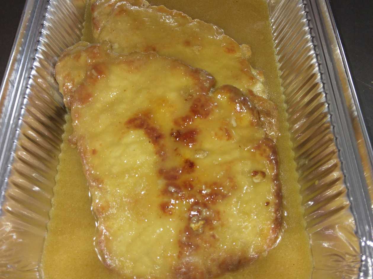 Cotlet de porc în unt cu usturoi