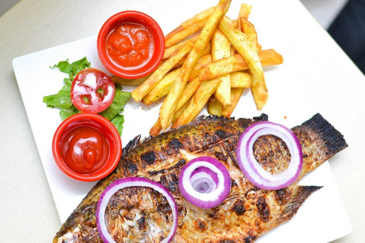 Yam Chips with Medium Sized Fried Tillapia
