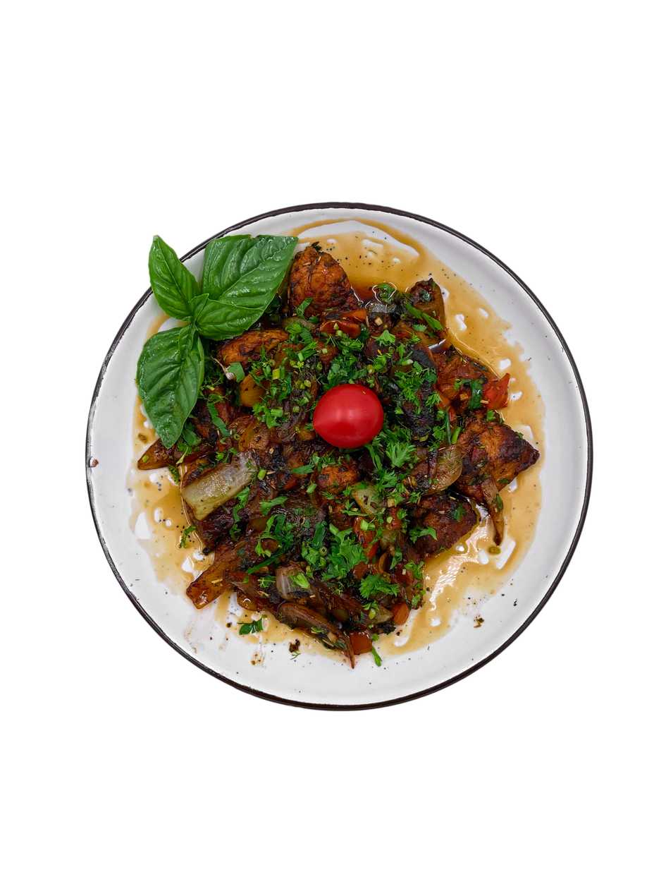 Пательня зі свинини  з овочами 100г