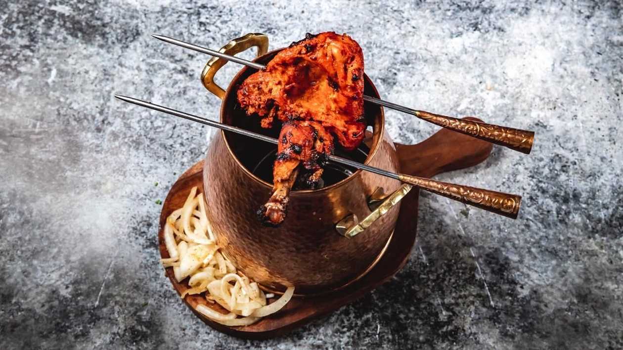 Whole chicken marinated and cooked in tandoor