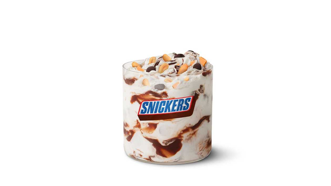 McFlurry™ Snickers® su šokolado užpilu