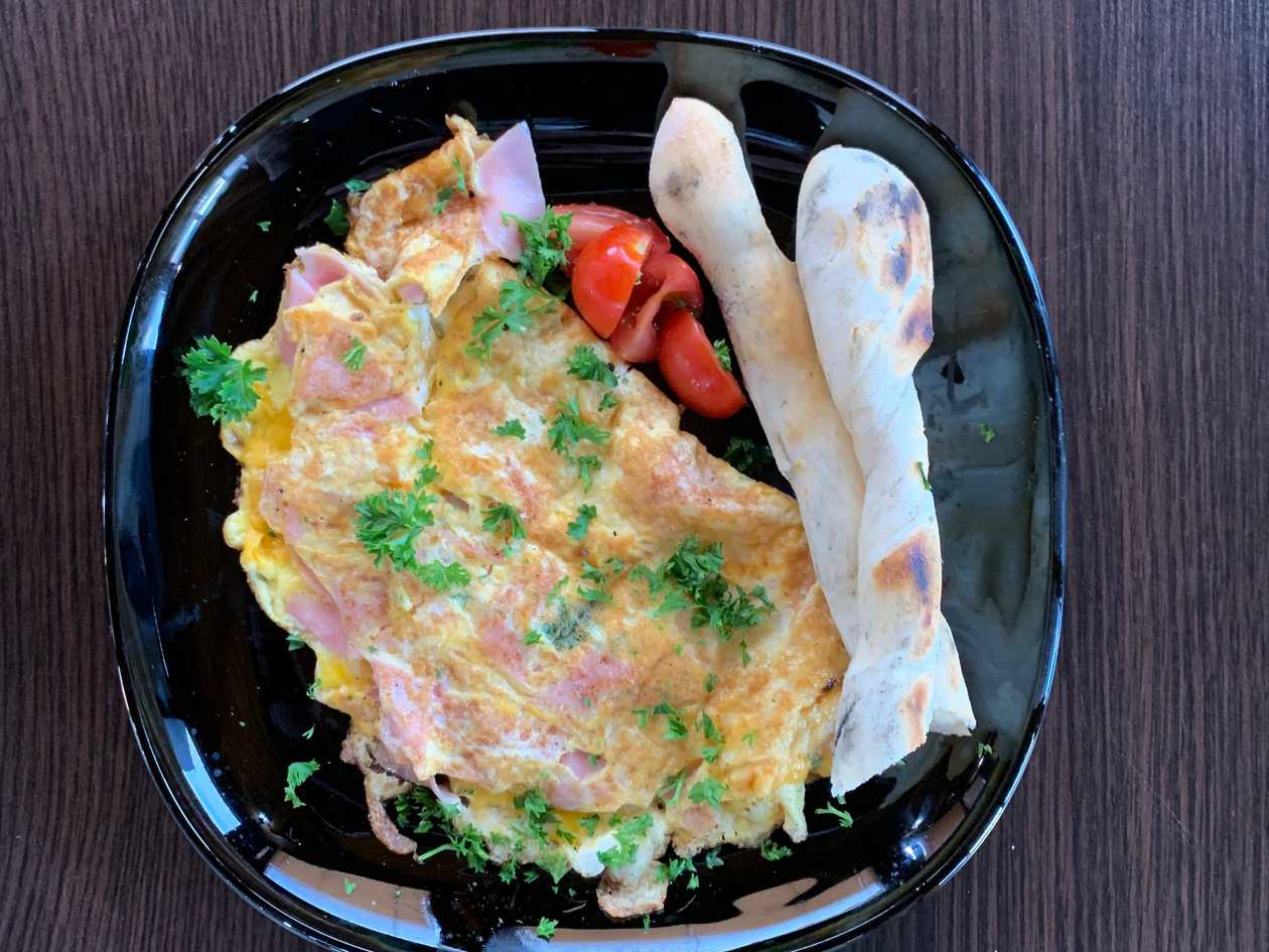 Omelet with ham and cheddar, freshly baked pletenec