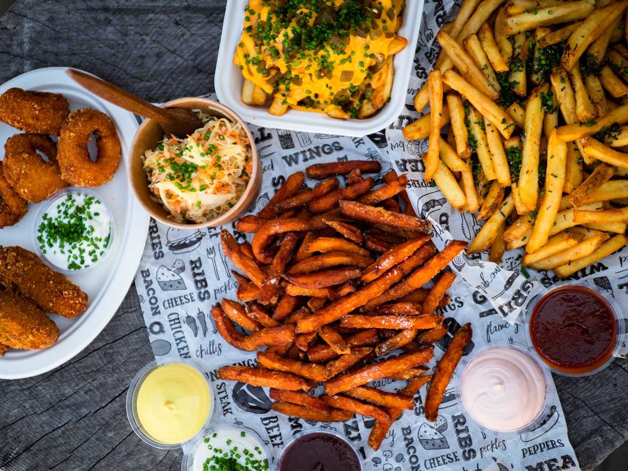 French fries with cheddar sauce, jalapenos and chives