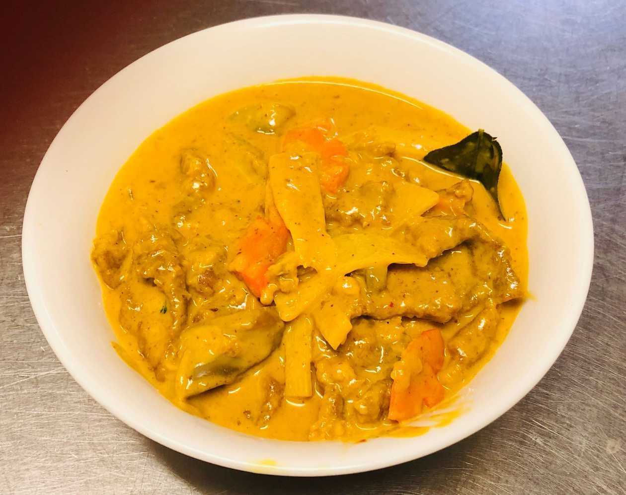 873. Thai Yellow Curry with Pork *