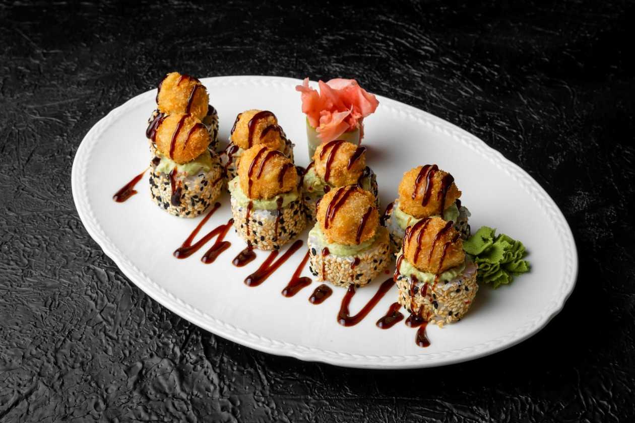 branded california roll with sesame seeds