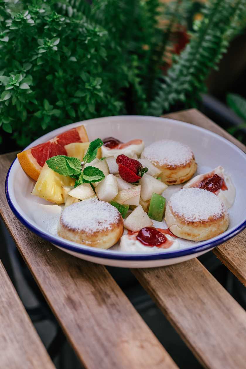 Syrniki With Fruits And Sour Cream