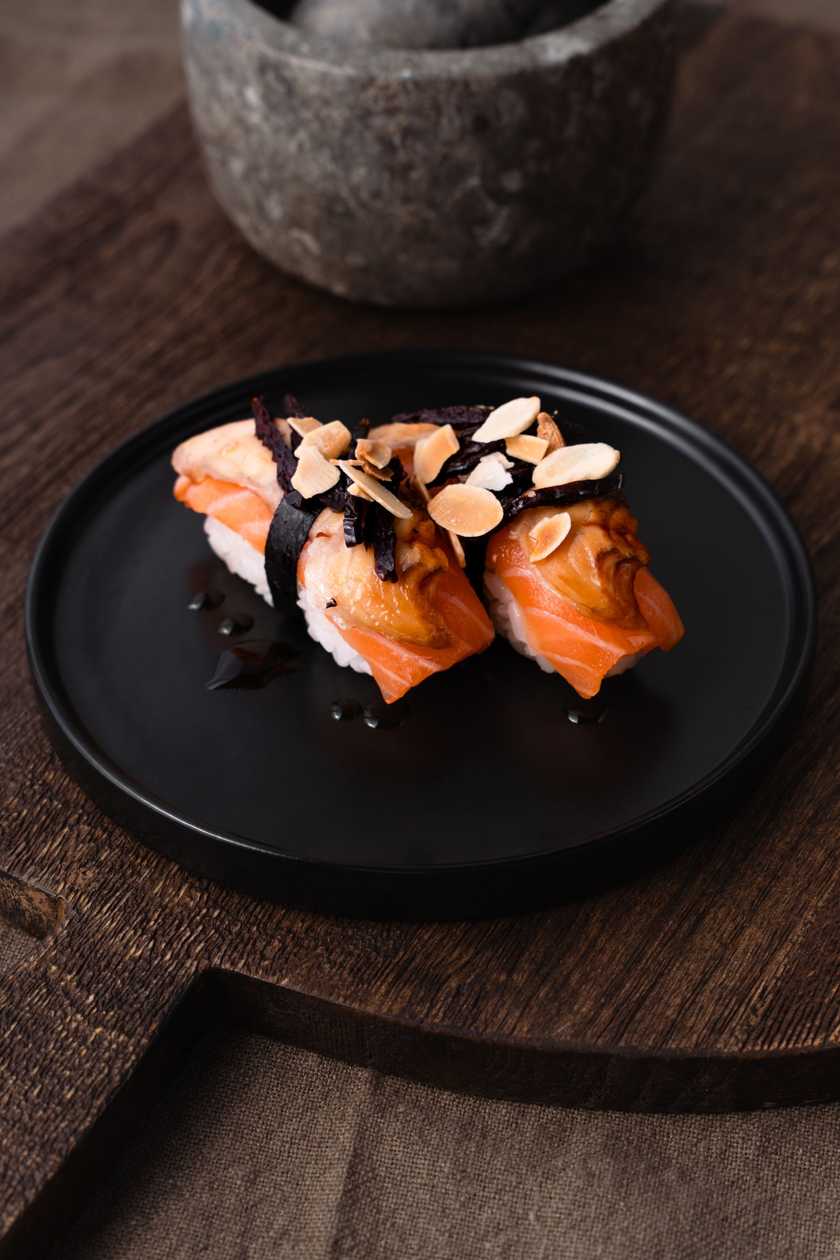 Nigiri Salmon, Eel, Dried Plum, Roasted Almonds, Sweet Kabayaki Sauce