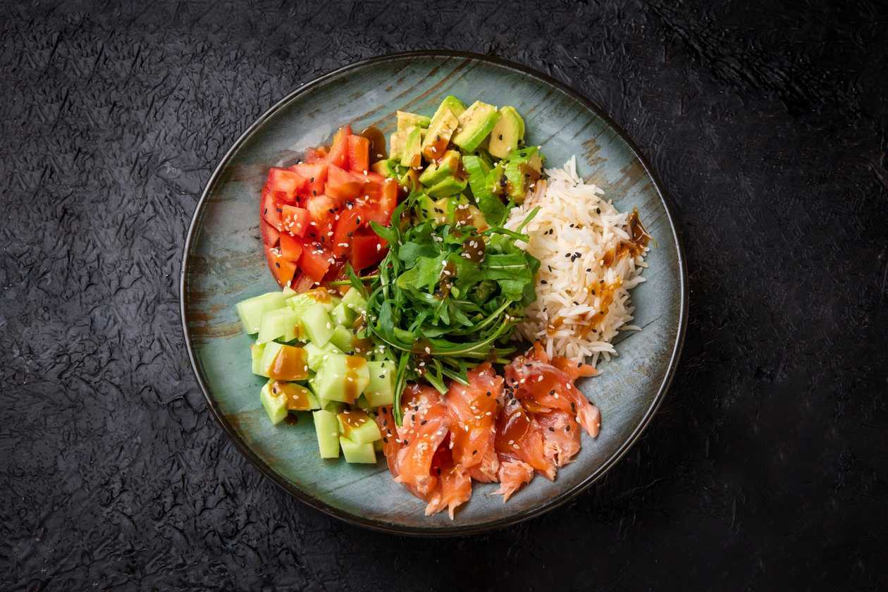 set BALL rice, salmon, cucumber, tomato, avacado, sesame and teriyaki sauce