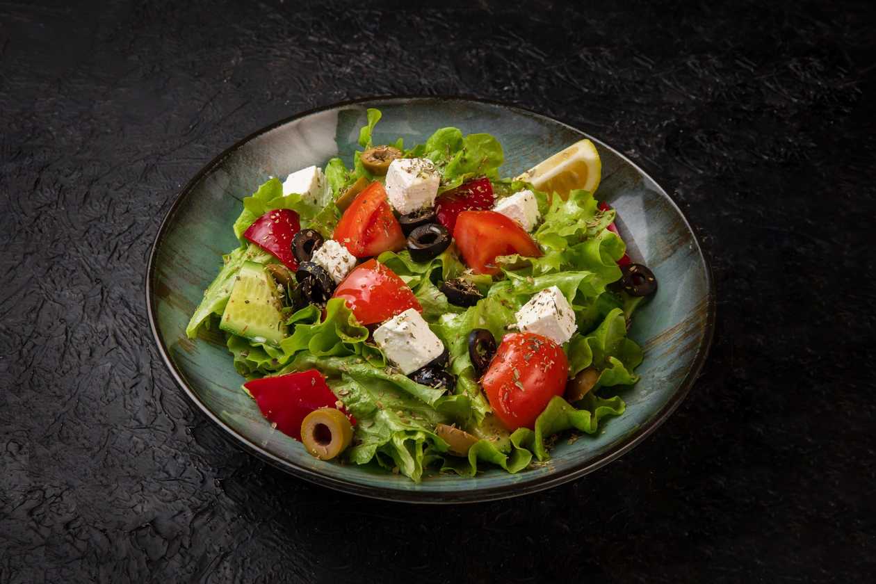 Greek salad - with feta, olives, bell peppers, cucumbers and tomatoes