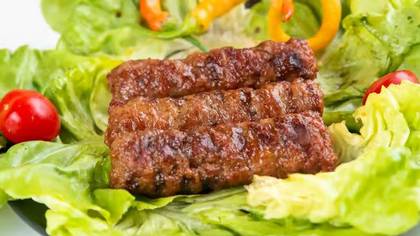 Giant grilled minced meat rolls