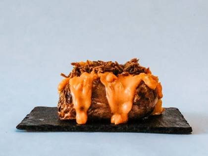 Baked Potato Stuffed with Shredded Beef and Cheddar Cheese