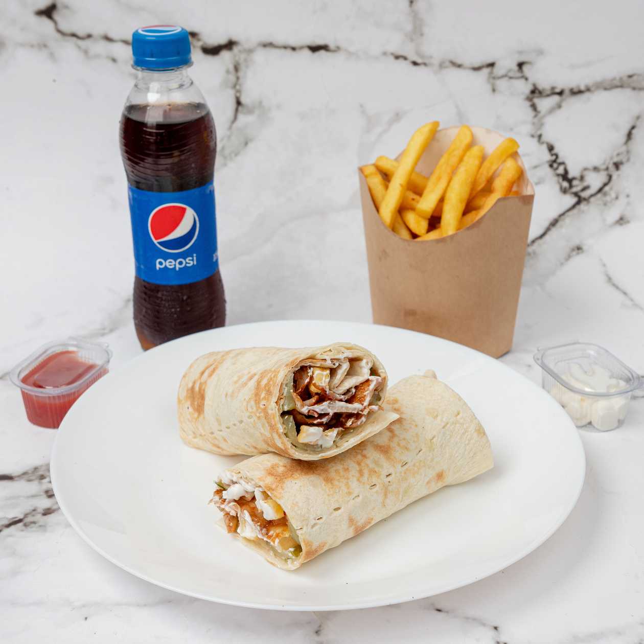 Şaurma lavaşda (Toyuq) + French fries + Pepsi (250 ml) və ya Ayran (180 ml)