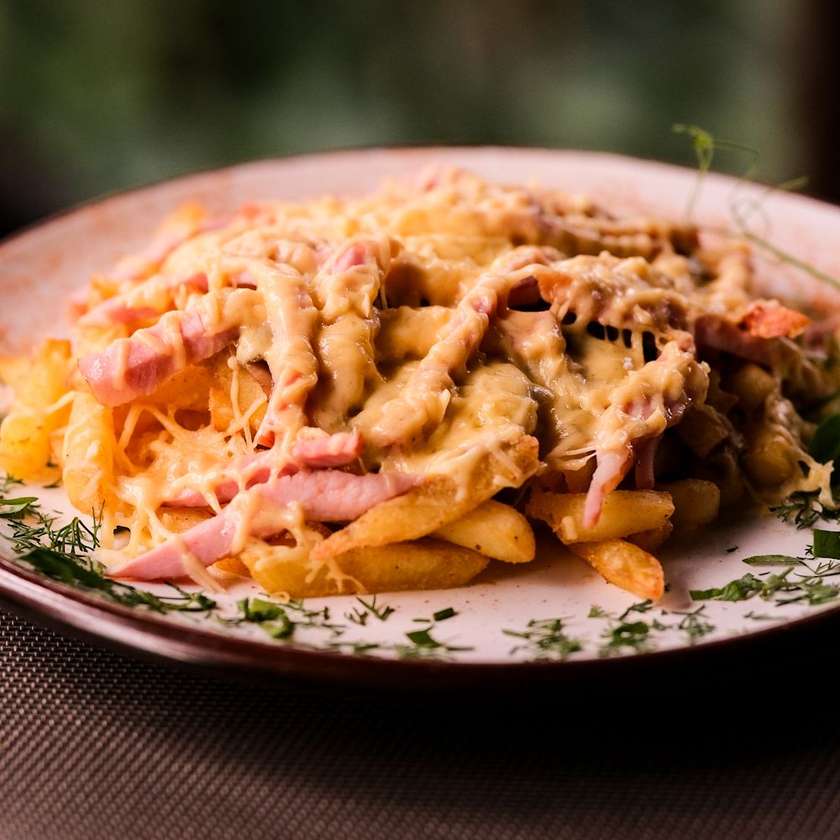 French Fries with Smoked Pork Loin, Cheese, and Mushrooms