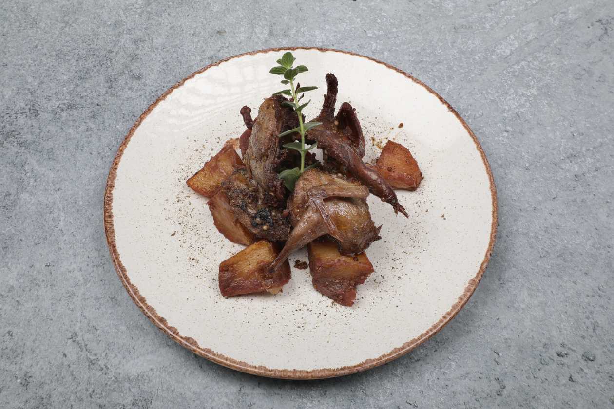 Quail In Wine With Antinachtes Potatoes