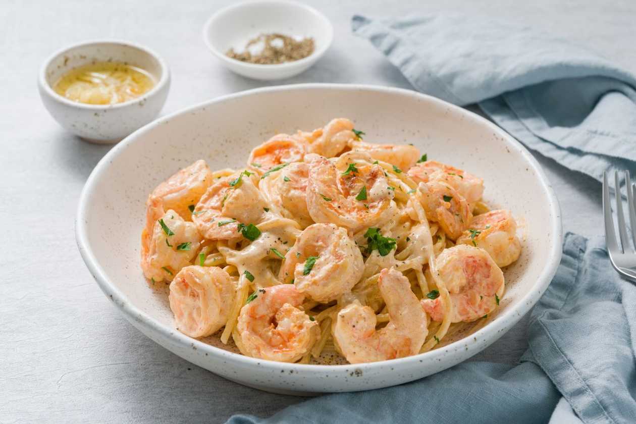 Istrian fusi pasta with shrimp, truffles and prosciutto
