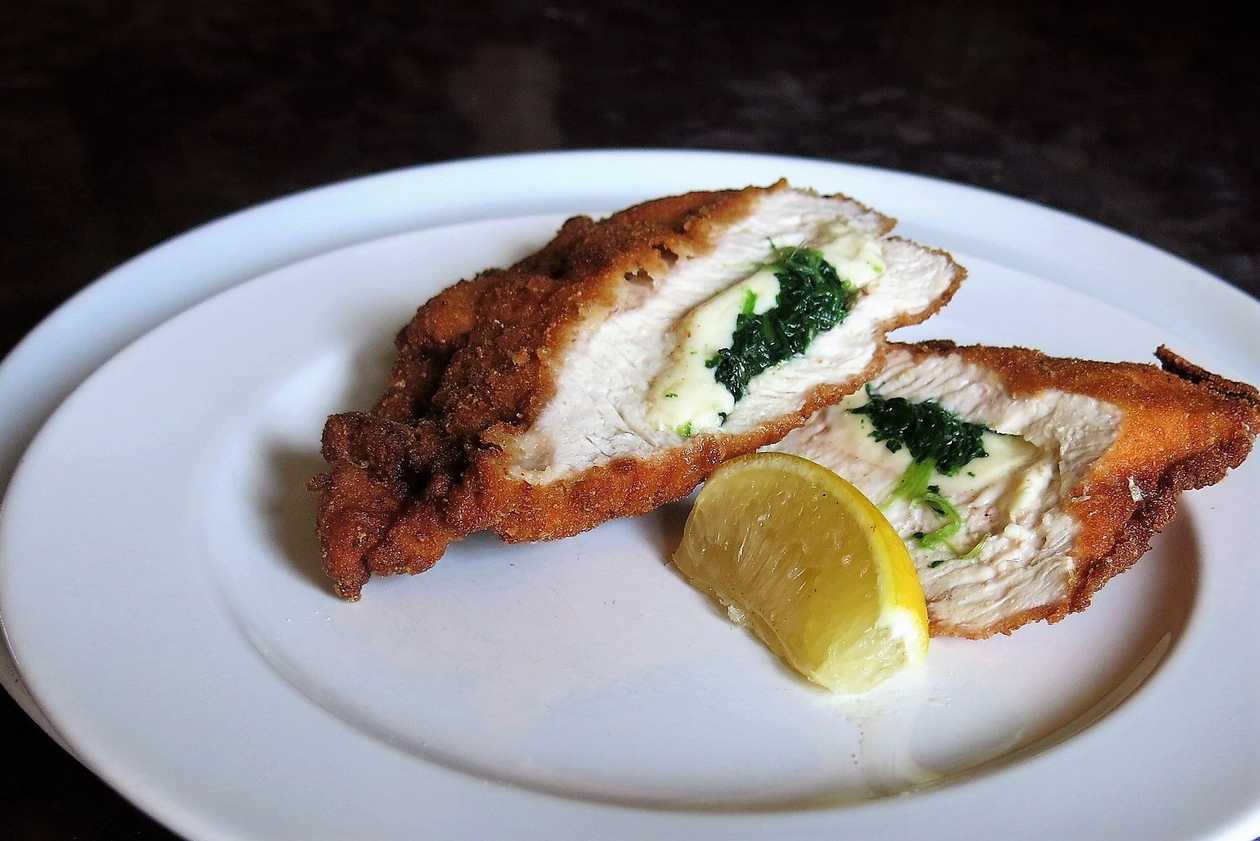 Fried turkey breast stuffed with spinach and cheese